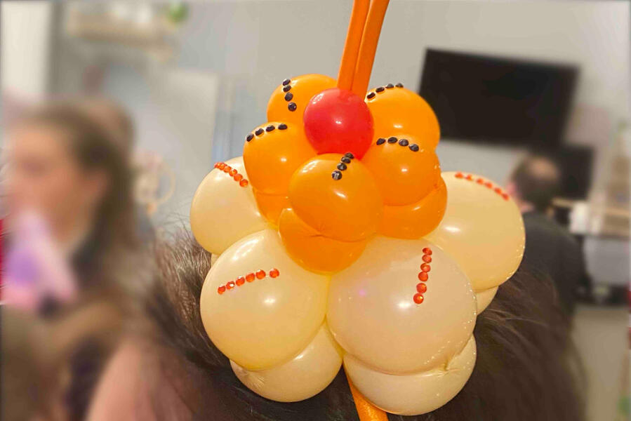 Sculpture sur ballons « Diadème fleuri réalisé en sculpture sur ballons »